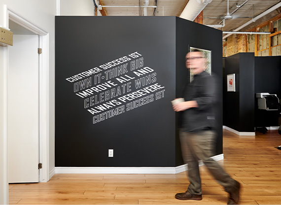 The Guiding Principles mural in REM's office